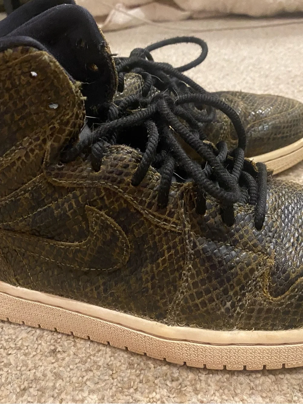 Jordan 1’s Black Snake-Texture High-Top Sneakers